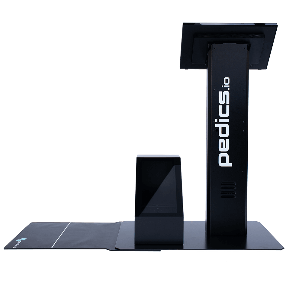 The pedics terminal in black in front view. It consists of a monitor stand with a touch screen, a 3D foot scanner and a pressure plate.